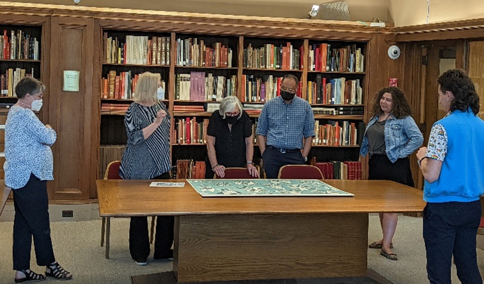 Art Talks attendees view Revised Endpapers for The Homosexual Neurosis (blue), 2013 by Hernan Bas in recognition of LGBTQ+ PRIDE Month. 