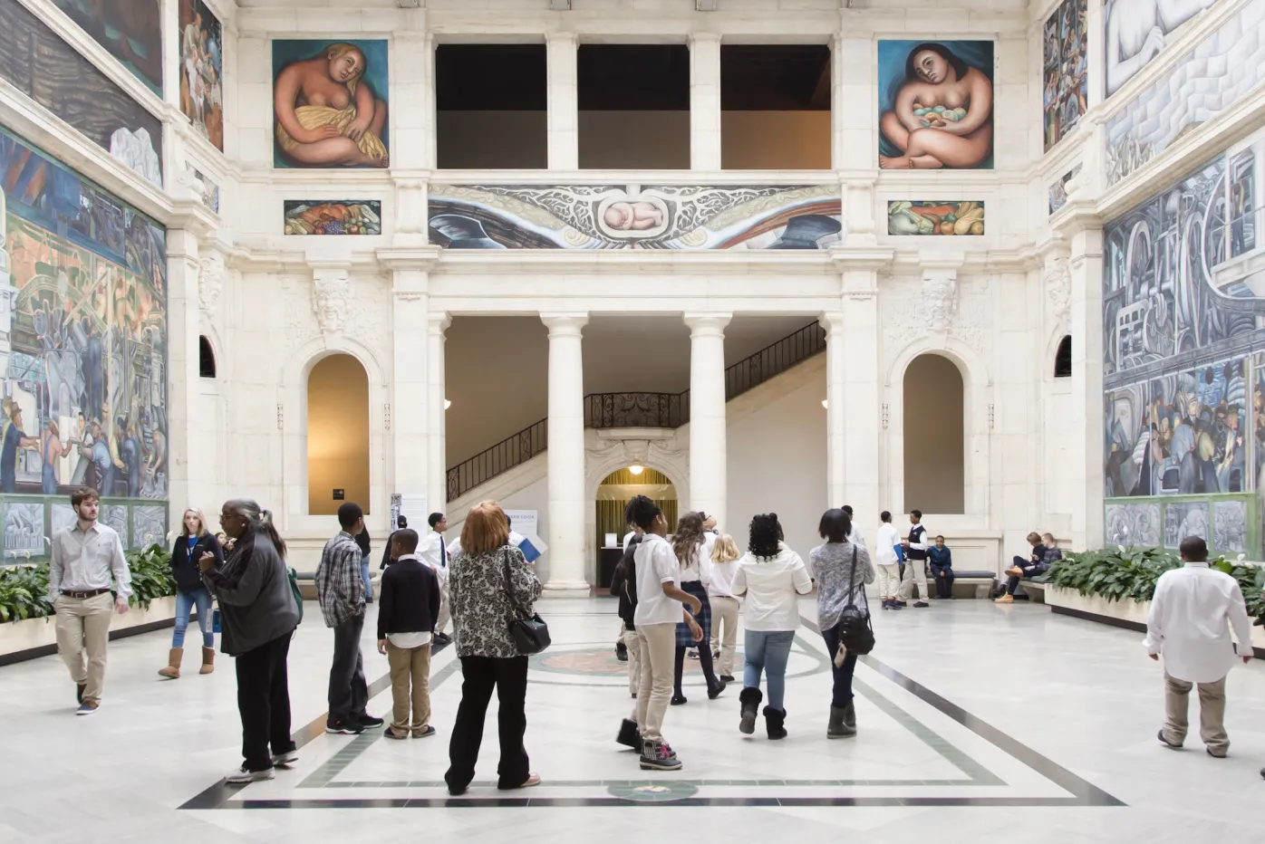 Visitors in Rivera Court at the Detroit Institute of Arts