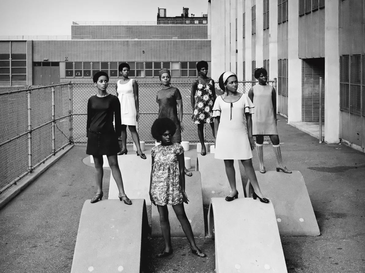 Kwame Brathwaite, Photo shoot at a public school for one of the AJASS-associated modeling groups that emulated the Grandassa Models and began to embrace natural hairstyles. Harlem, ca. 1966; from Kwame Brathwaite: Black Is Beautiful (Aperture, 2019)