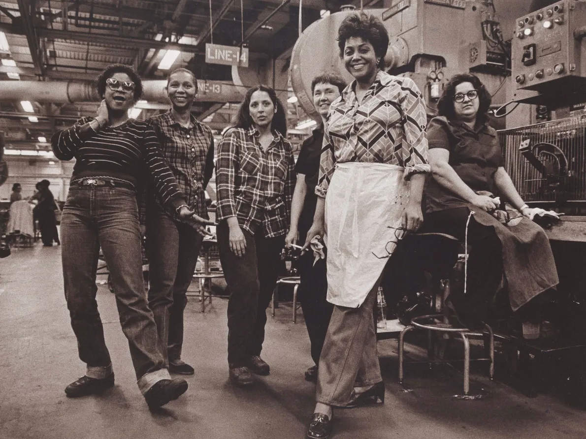 "Press Operators, GM Fisher Body Trim Plant, Fort Street, Detroit Michigan," 1982, Russ Marshall, American; gelatin silver print.