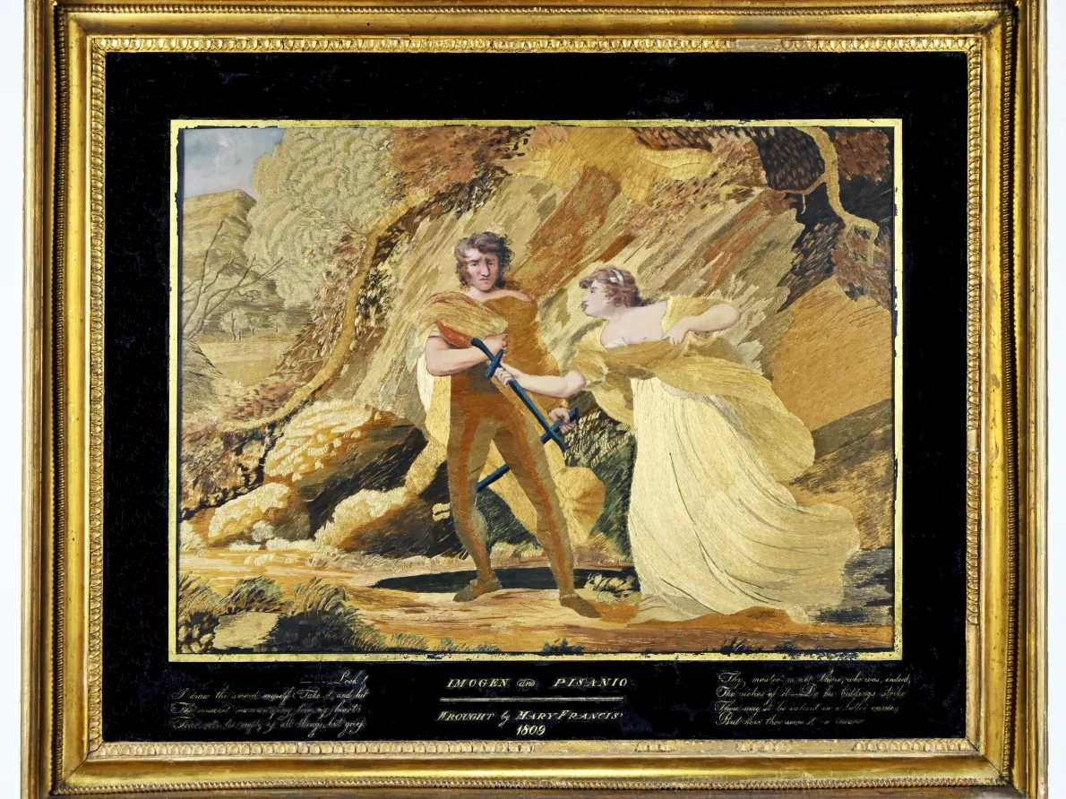 Woman holding sword in front of a soldier, in front of a gold tree. 